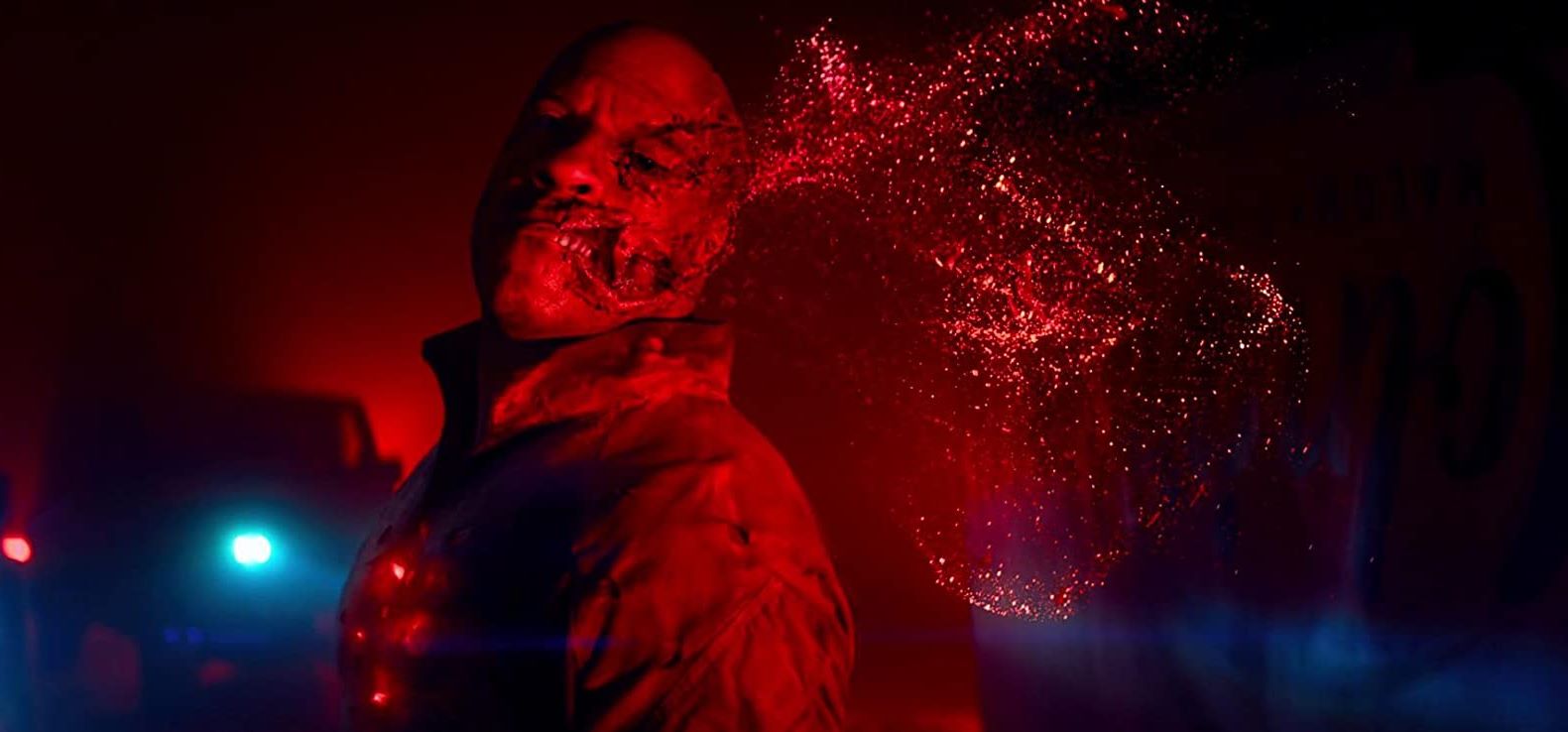 Vin Diesel's cheek explodes in a cloud of nanoparticles in Bloodshot (2020)