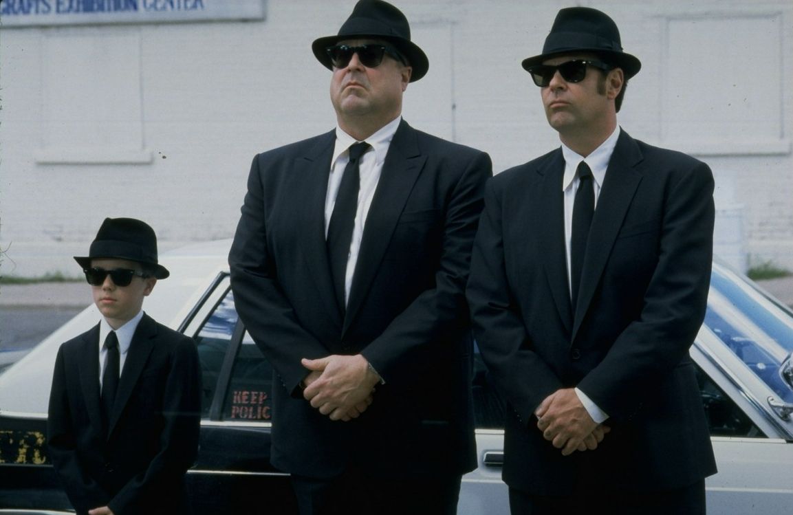 Thew Blues Brothers - (l to r) Buster (J. Evan Bonifant), Mighty Mack McTeer (John Goodman) and Elwood Blues (Dan Aykoyd) in Blues Brothers 2000 (1998)