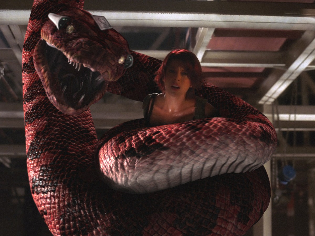 Angel Boris gets enwrapped in a giant snake in Boa vs Python (2004)