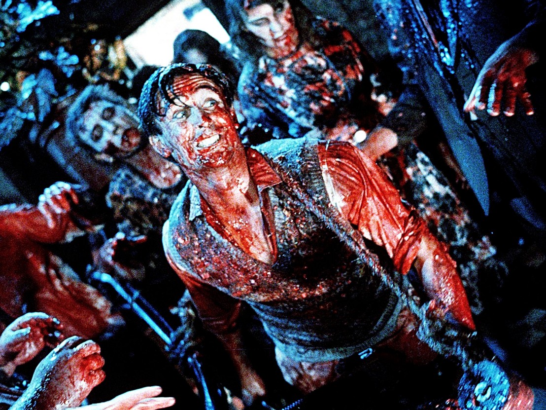 Tim Balme wades through zombie hordes and buckets of gore in Braindead (1992)