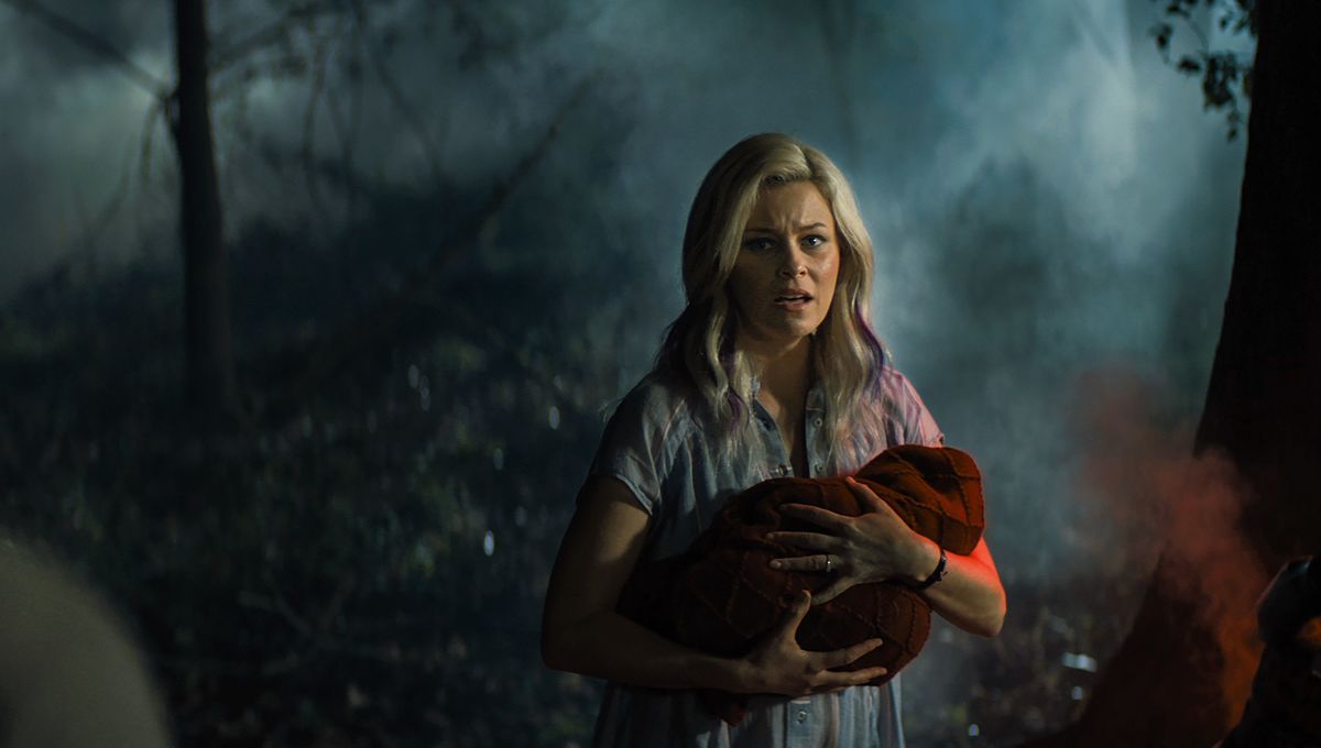Elizabeth Banks takes the baby from the crashed spaceship in Brightburn (2019)