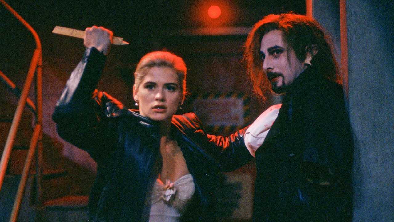 Buffy (Kristy Swanson) prepares to stake vampire Paul Reubens in Buffy the Vampire Slayer (1992)