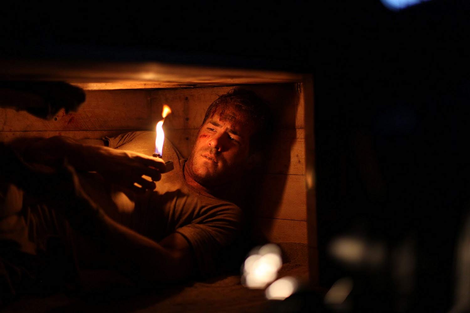 Ryan Reynolds trapped in a coffin in Buried (2010