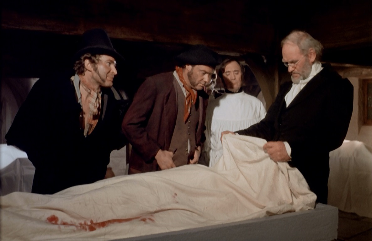 (l to r) Burke (Derren Nesbitt) and Hare (Glynn Edwards) deliver a cadaver to Dr Knox (Harry Andrews) (r) in Burke & Hare (1972)