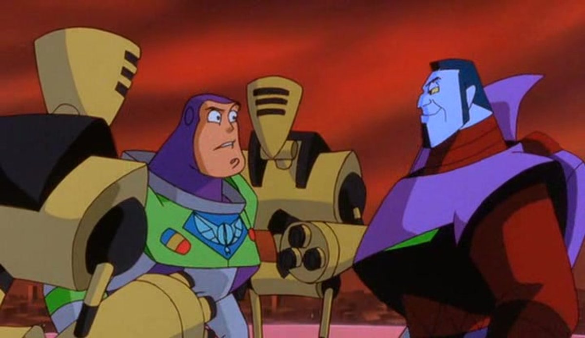 Buzz Lightyear (voiced by Tim Allen) captured by Emperor Zurg (voiced by Wayne Knight) in Buzz Lightyear of Star Command: The Adventure Begins (2000)