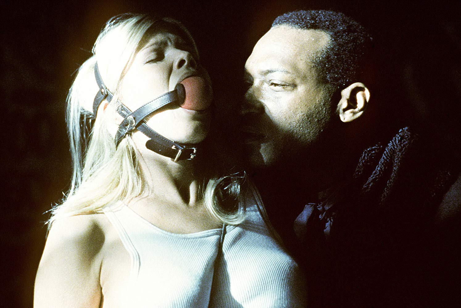 Donna D'Errico is tormented by the Candyman (Tony Todd) in Candyman: Day of the Dead (1999)