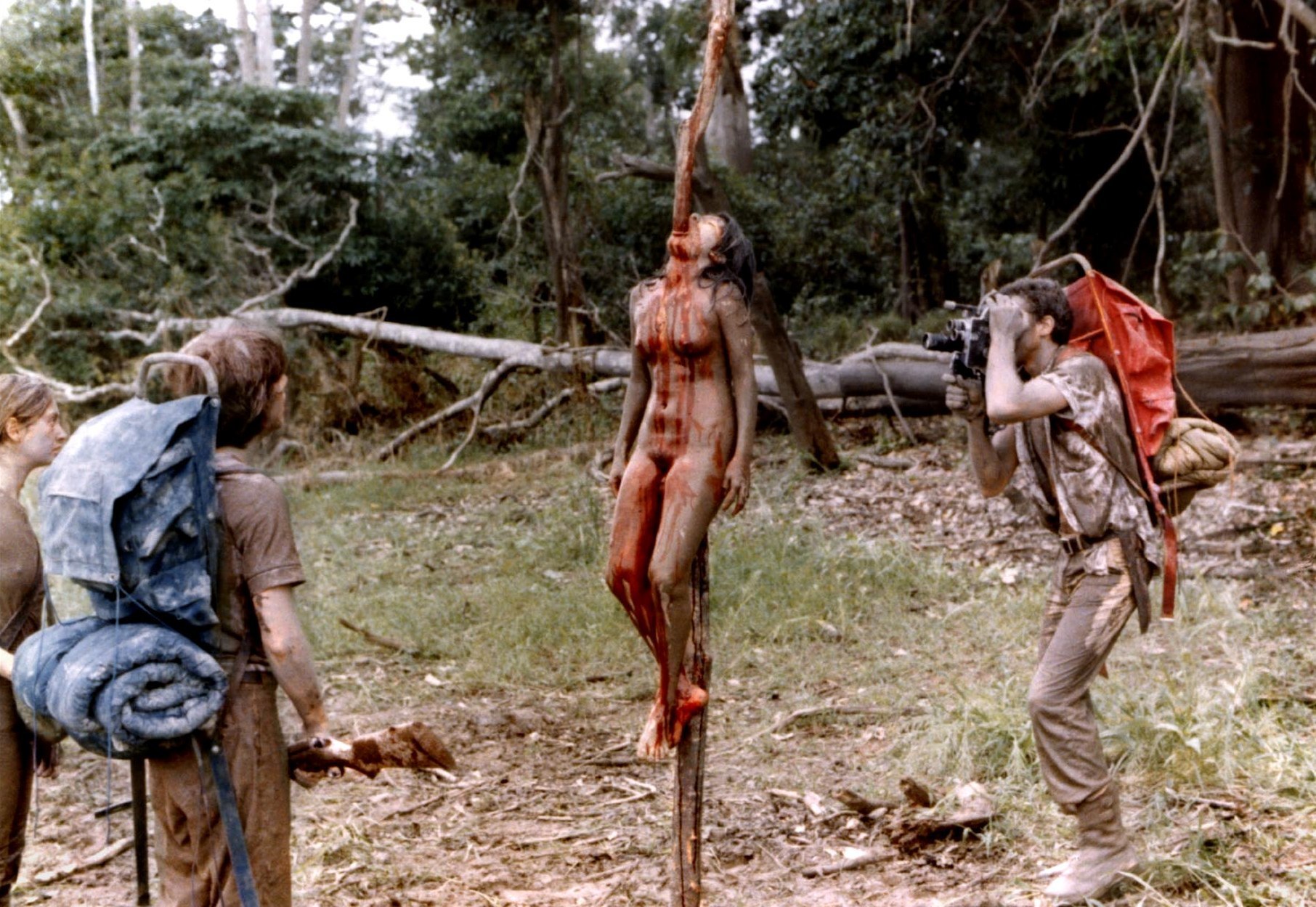 The party encounter mutilated bodies in Cannibal Holocaust (1979)