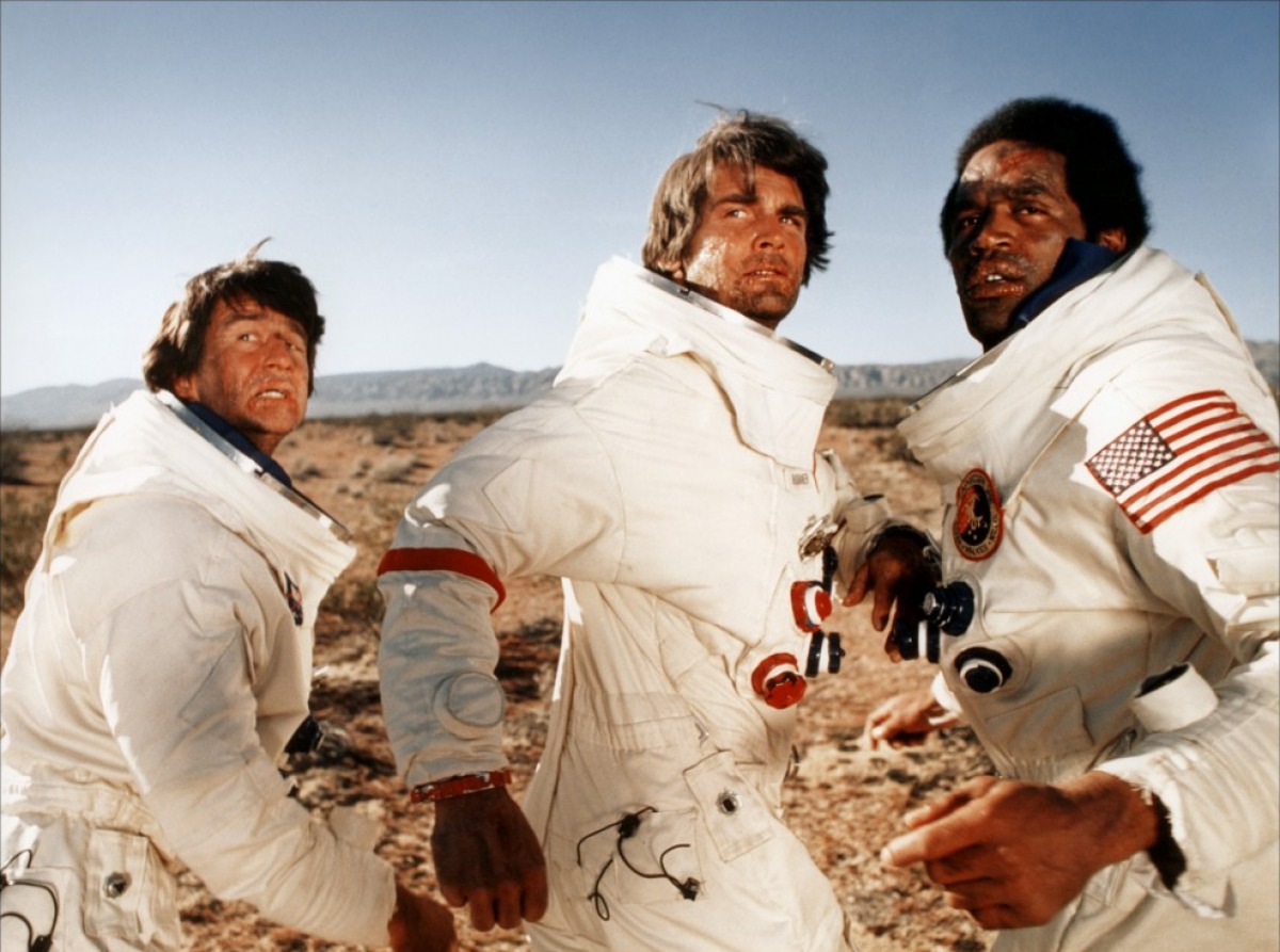 The astronauts - (l to r) Sam Waterston, James Brolin and O.J. Simpson - escape into the desert in Capricorn One (1978)