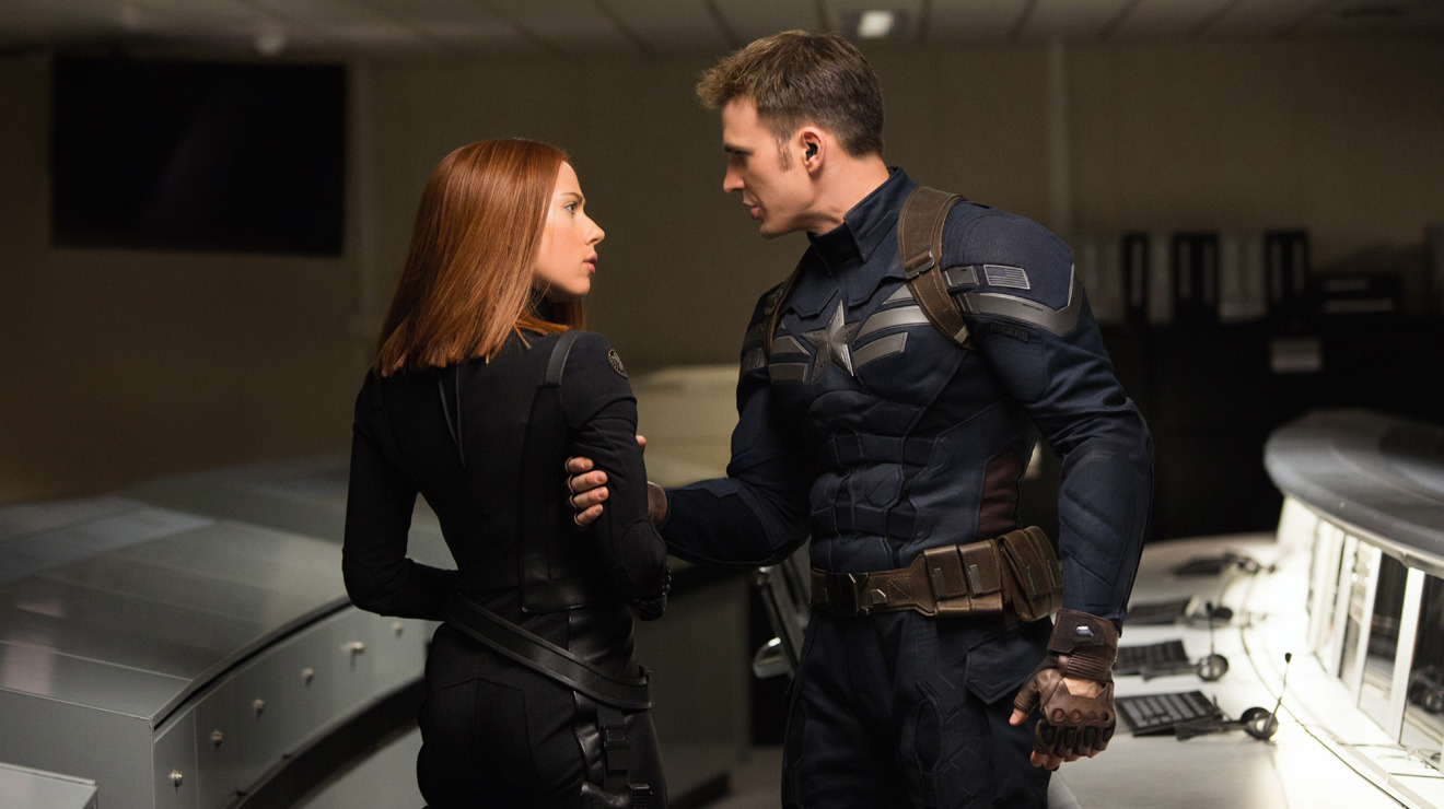 Captain America (Chris Evans) has a quiet word with Black Widow (Scarlett Johansson) in Captain America: The Winter Soldier (2014)