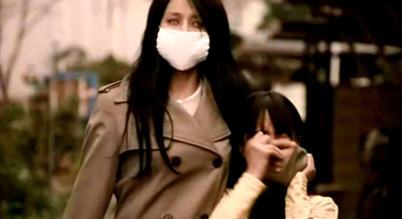 The Kuchisake-onna (Miki Mizuno) in Carved: The Slit-Mouthed Woman (2007)