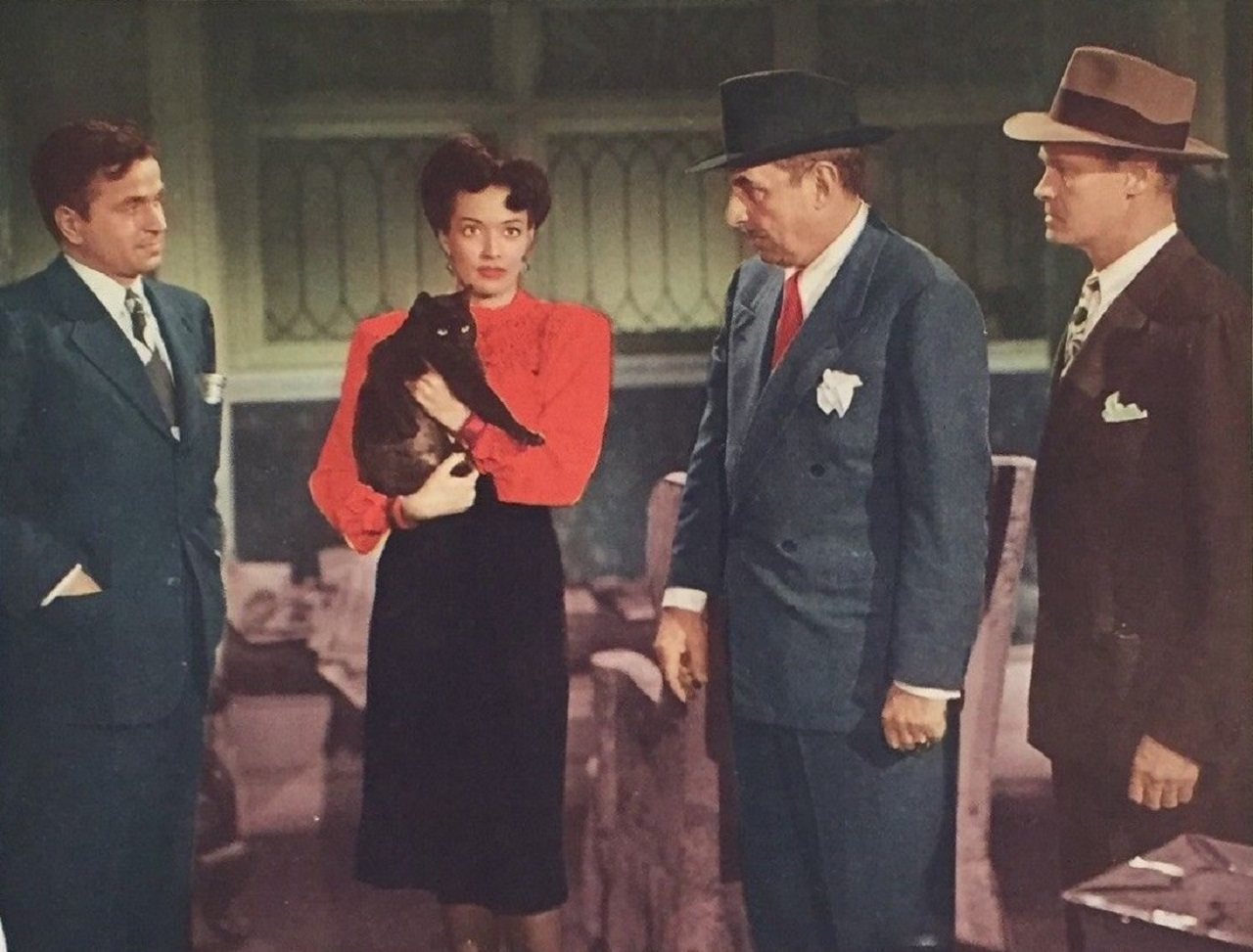 William B. Davidson, Iris Clive, Douglas Dumbrille and Fred Brady in The Cat Creeps (1946)