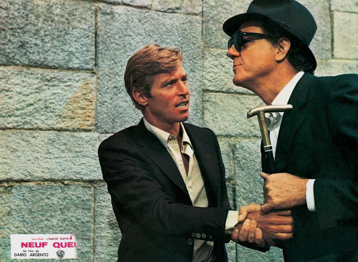 Journalist James Franciscus and blind crossword designer Karl Malden in The Cat O'Nine Tails (1971)