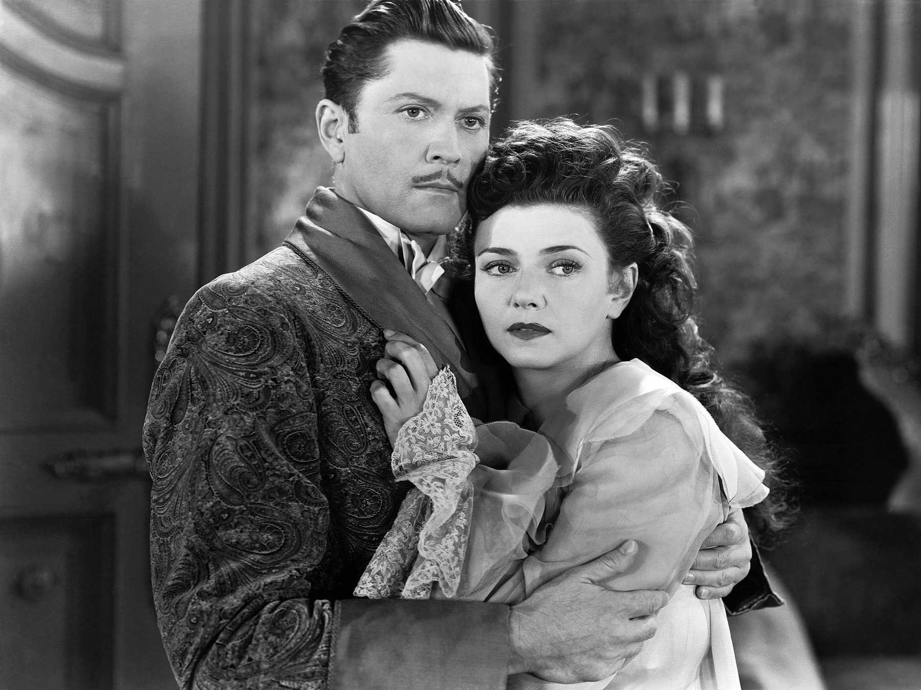 Carl Esmond with Lenore Aubert in The Catman of Paris (1946)