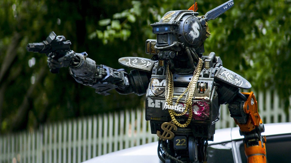 Chappie gets pimped out and goes car-jacking in Chappie (2015)