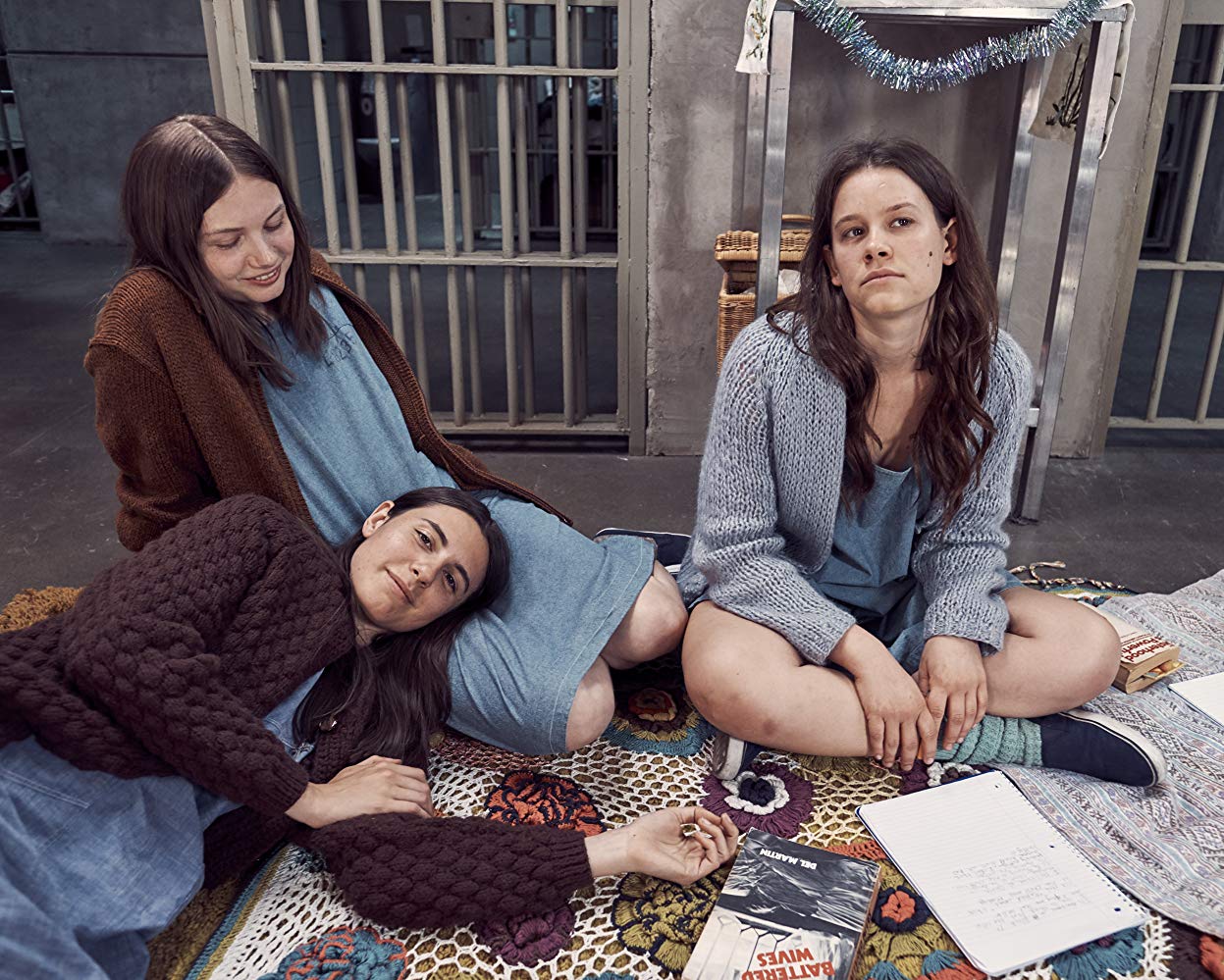 The Manson Girls - (clockwise from bottom left) Susan Atkins (Marianne Rendon), Leslie Van Houten (Hannah Murray) and Patricia Krenwinkle (Sosie Bacon) in Charlie Says (2018)