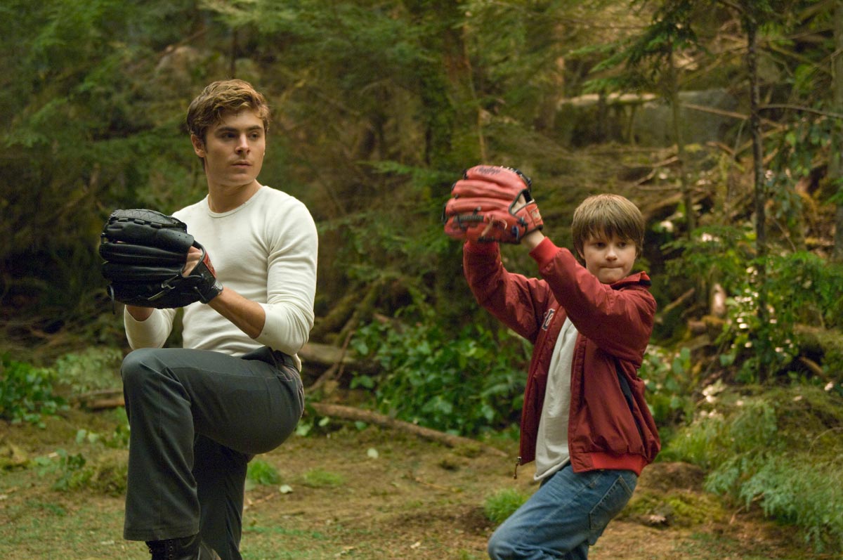 Charlie (Zac Efron) plays ball with the ghost of his brother Sam (Charlie Tahan) in Charlie St. Cloud (2010)