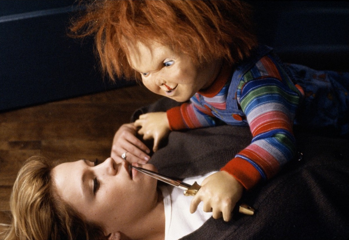 Chucky attacks Christine Elise in Child's Play 2 (1990)