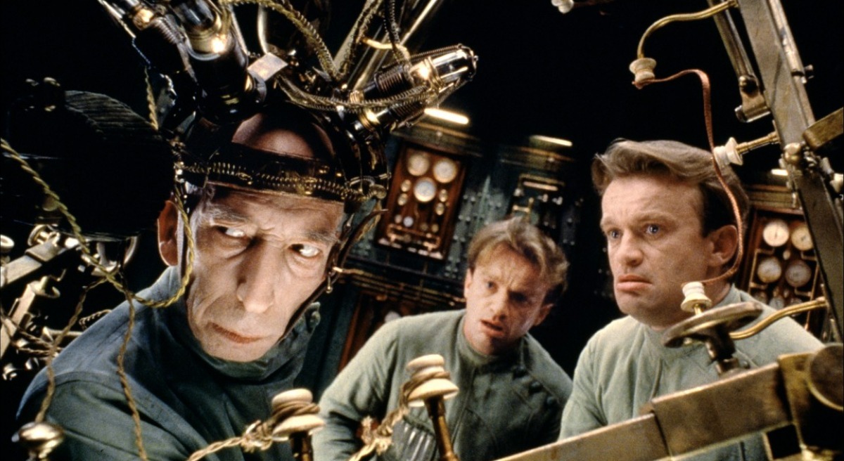 The scientist Krank (Daniel Emilfork) and two of the clones of Dominique Pinon in The City of Lost Children (1995)