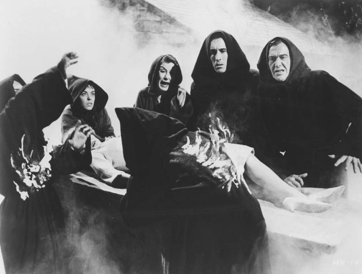 The town of witches with Christopher Lee (second from right) in City of the Dead (1959)