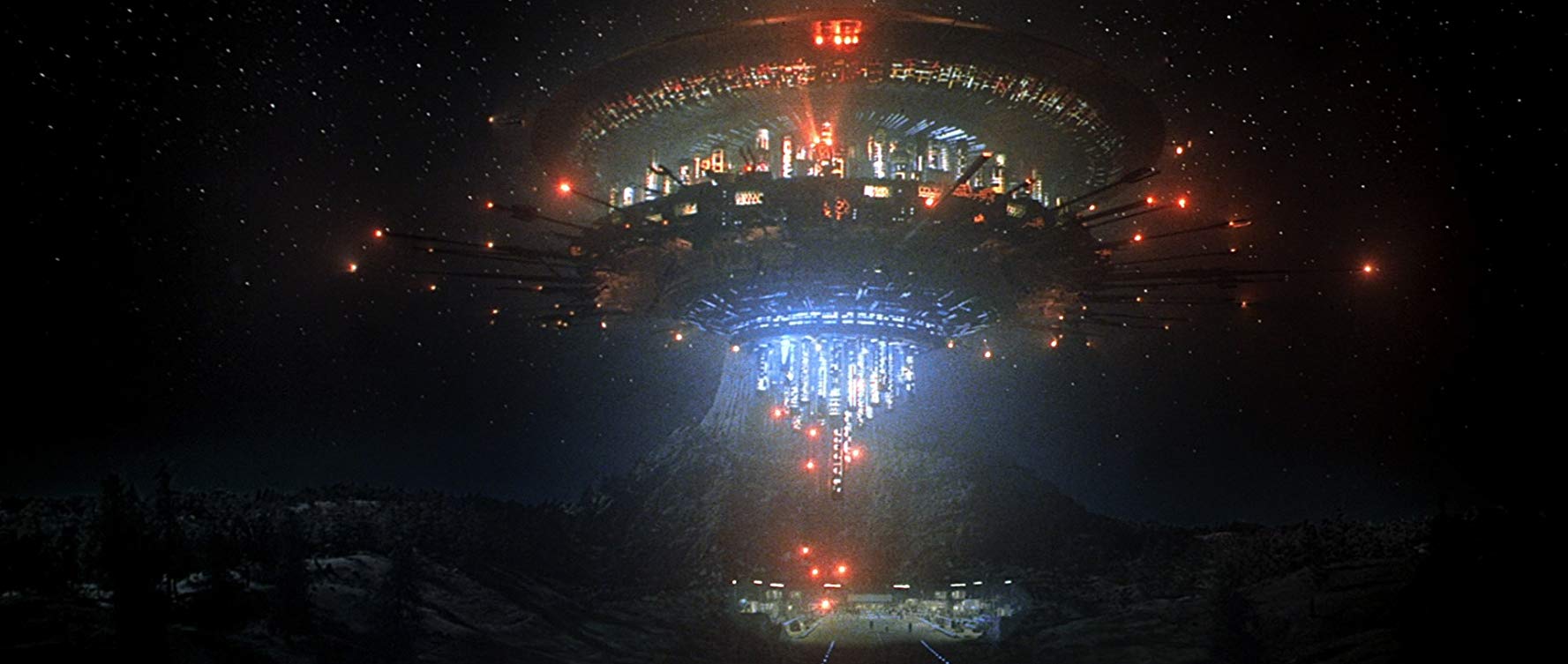 The appearance of the alien mothership over Devil's Tower in Close Encounters of the Third Kind (1977)