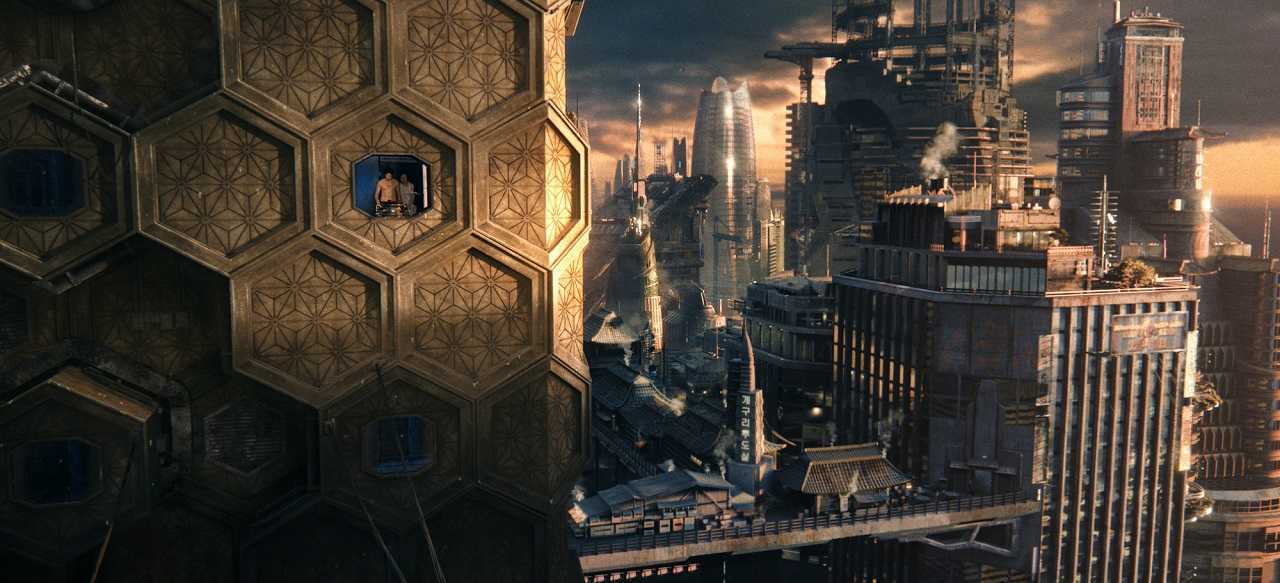 Soldier Hae-Joo Chang (Jim Sturgess) and fabricant Somni-451 (Doona Bae) make an escape through Neo-Seoul of 2441 in Cloud Atlas (2012)