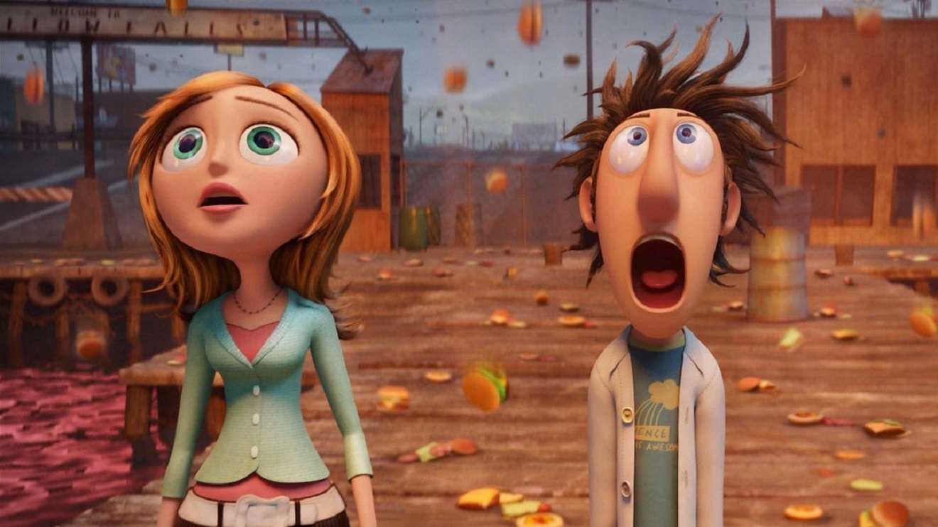 Sam Sparks and Flint Lockood stand in the midst of a rain of food in Cloudy With a Chance of Meatballs (2009)