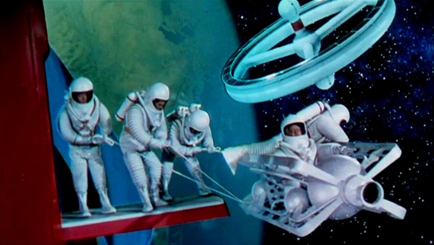 Astronauts using the space taxi in Conquest of Space (1955)