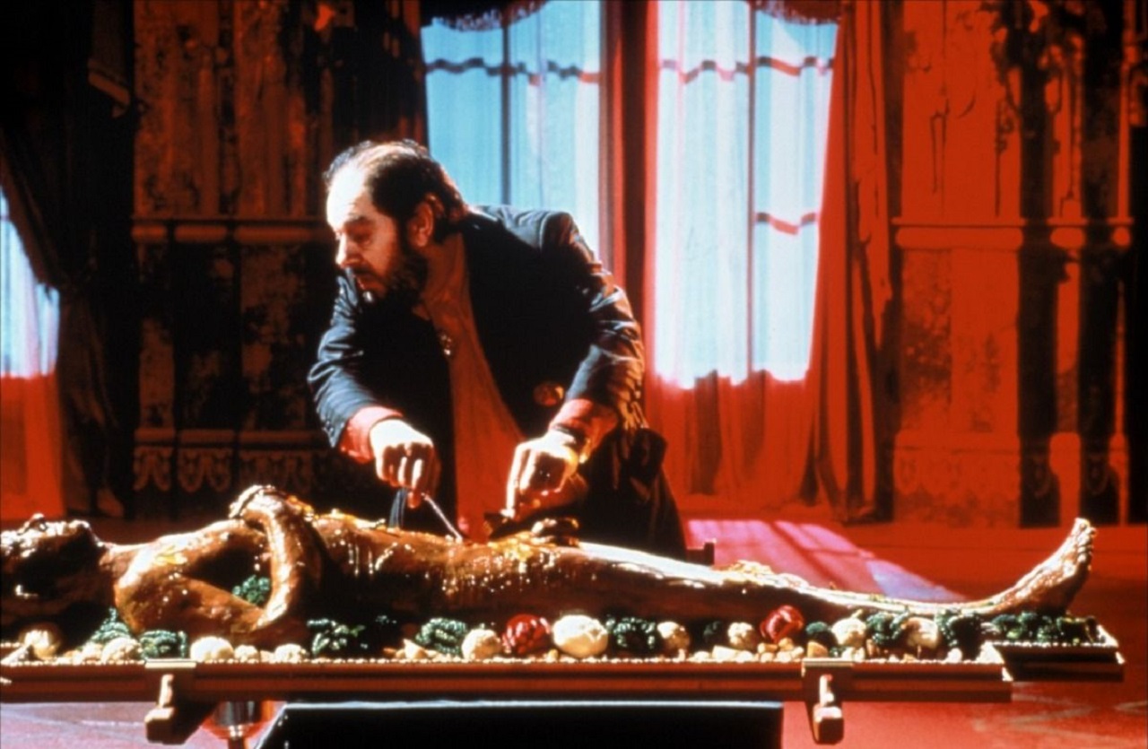 Albert Spica (Michael Gambon) dines on a human body in The Cook, The Thief, His Wife and Her Lover (1989)
