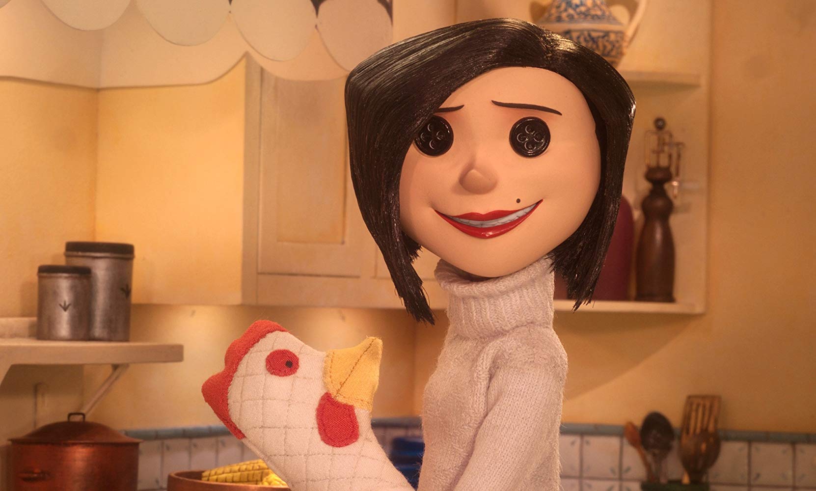 Coraline's mother with buttons for eyes in Coraline (2009)