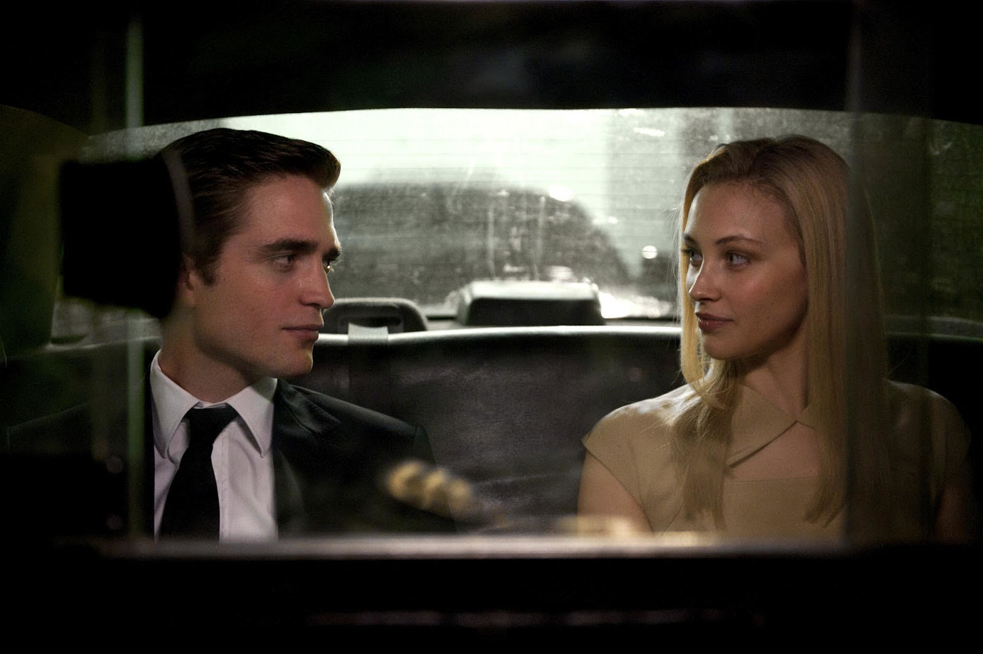 Robert Pattinson and wife Sarah Gadon in Cosmopolis (2012)