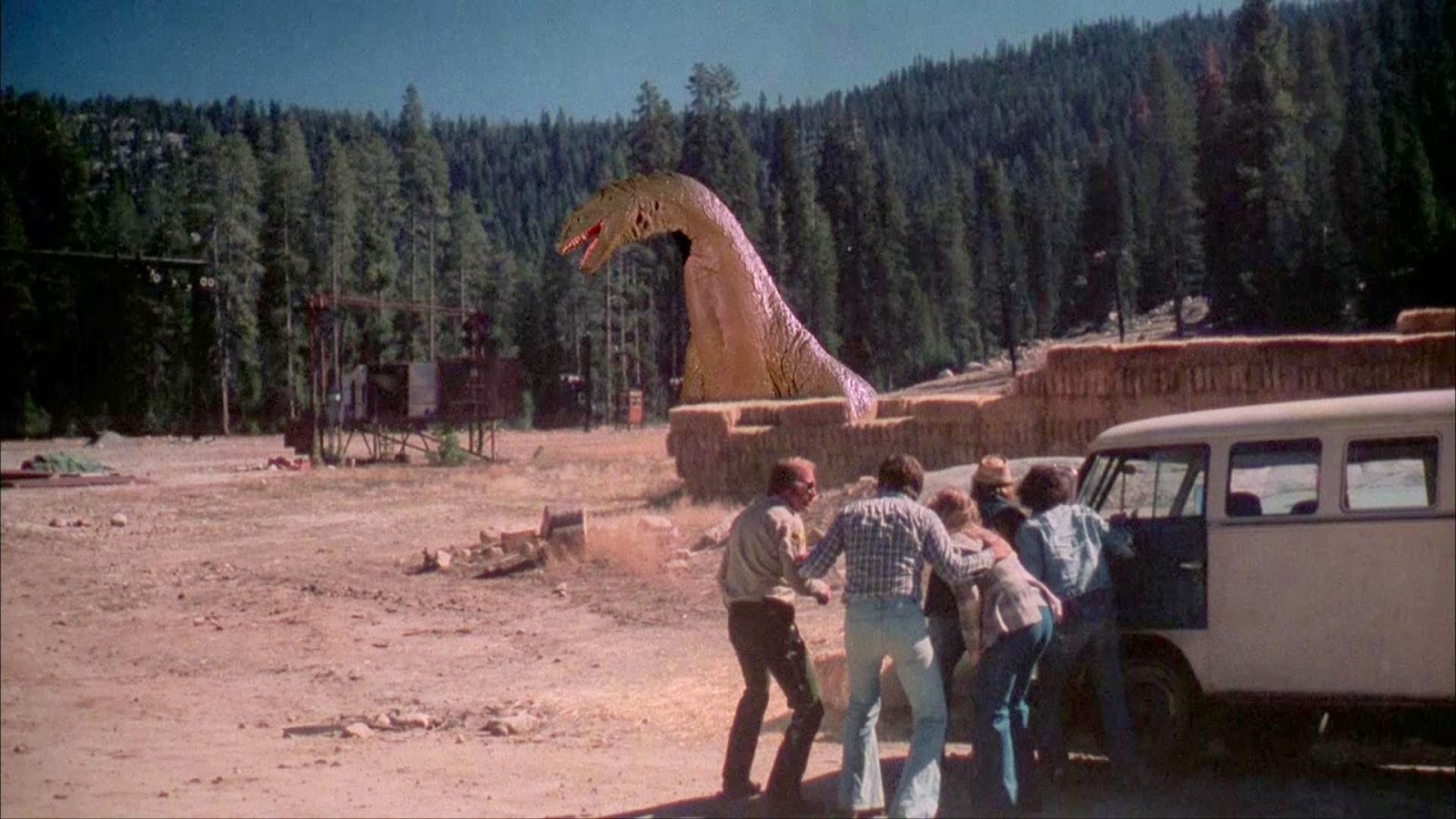 The stop-motion animated dinosaur emerges from the lake in The Crater Lake Monster (1977)