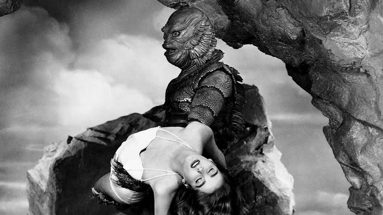 The Gill Man (Ben Chapman) abducts Julia Adams in The Creature from the Black Lagoon (1954)