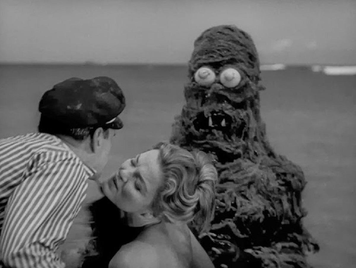 Anthony Carbone, Betsy Jones-Moreland and the sea monster in Creature from the Haunted Sea (1961)