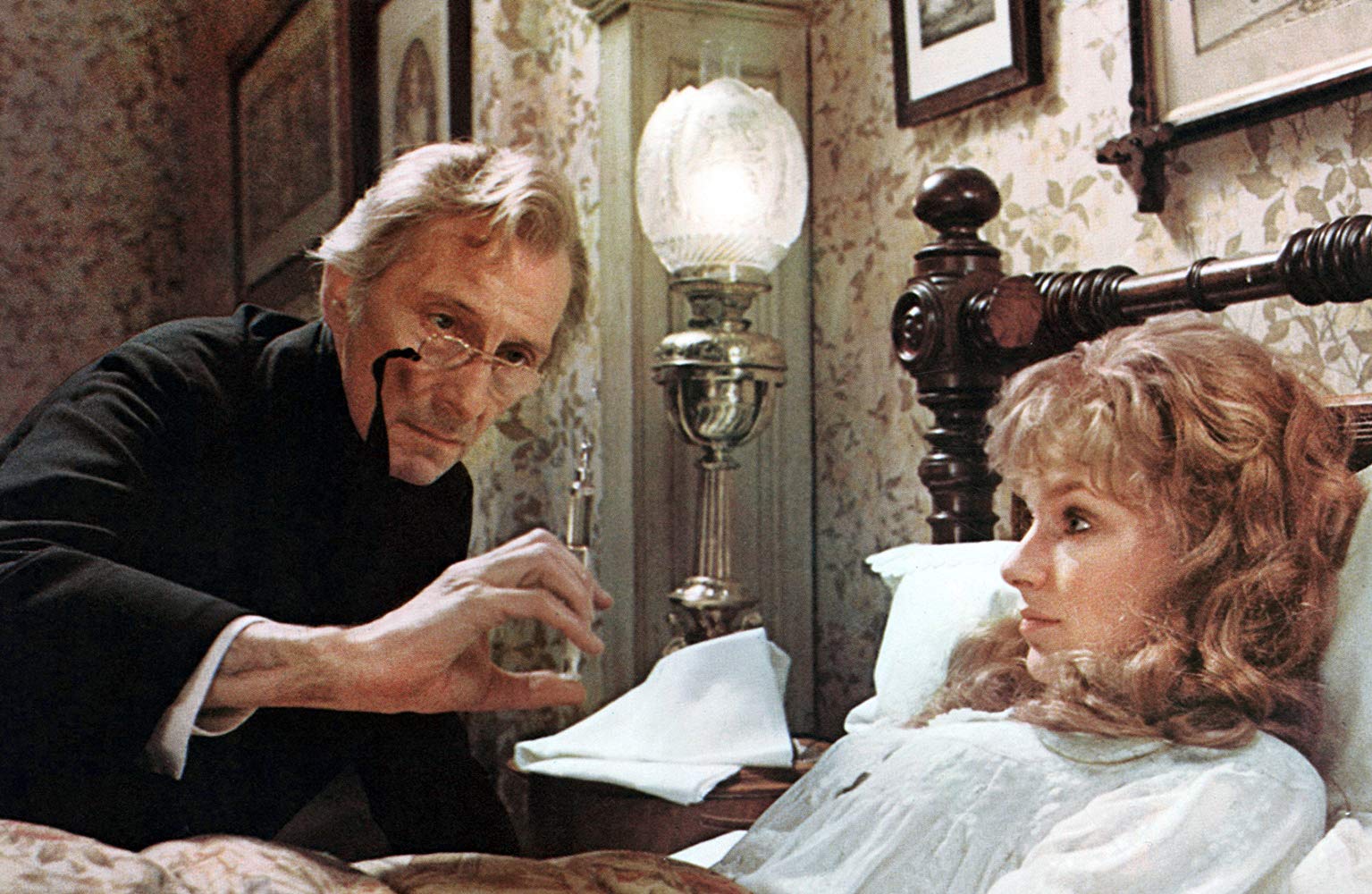 Peter Cushing injects daughter Lorna Helbron with the serum in The Creeping Flesh (1973)