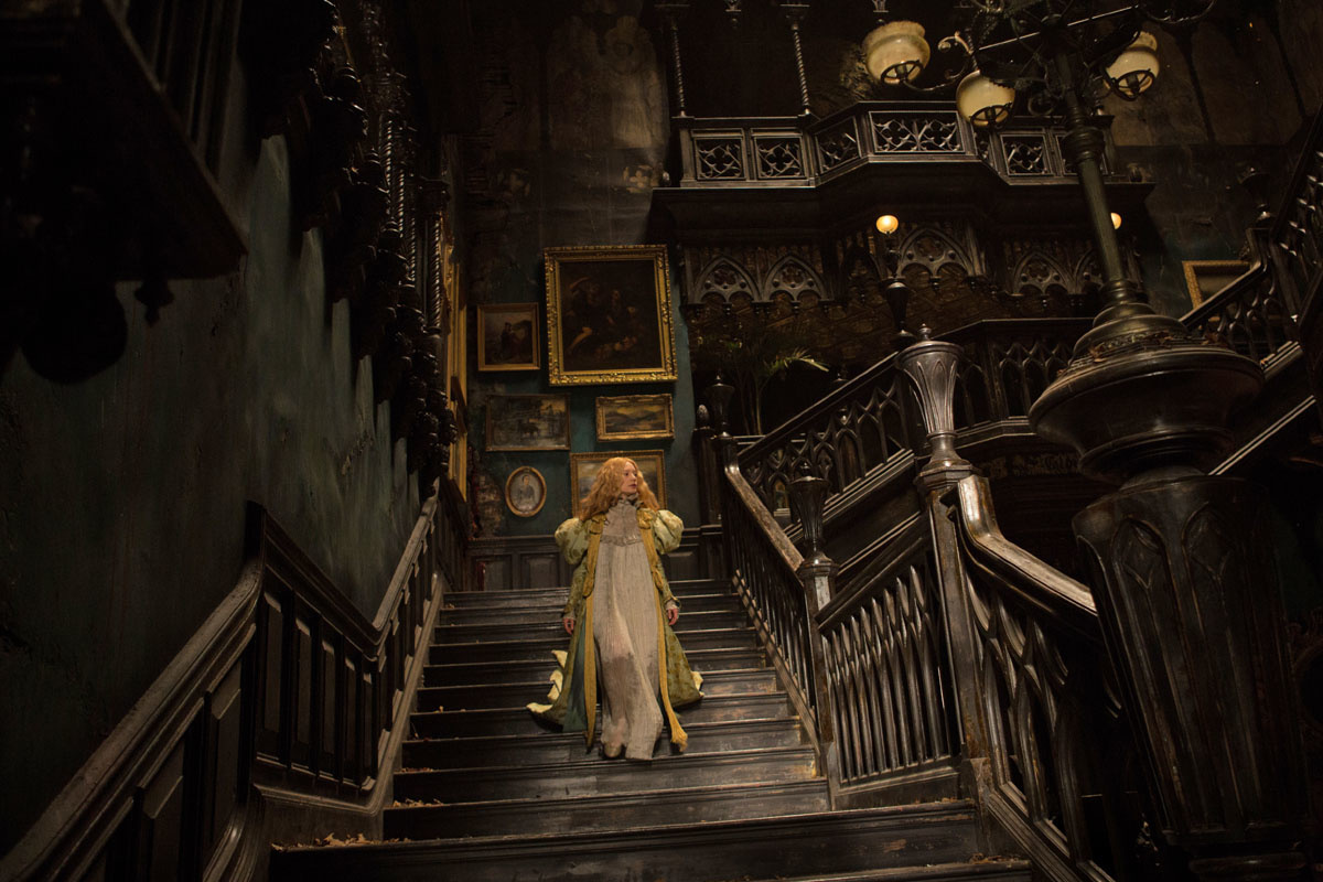 Mia Wasikowska comes down the stairs in Crimson Peak (2015)