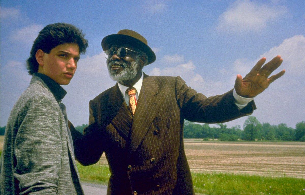 (l to r) Ralph Macchio and aging bluesman Joe Seneca in Crossroads (1986)