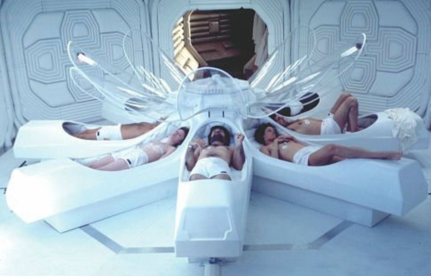 The crew of the Nostromo awake from cryogenic hypersleep in Alien (1979)