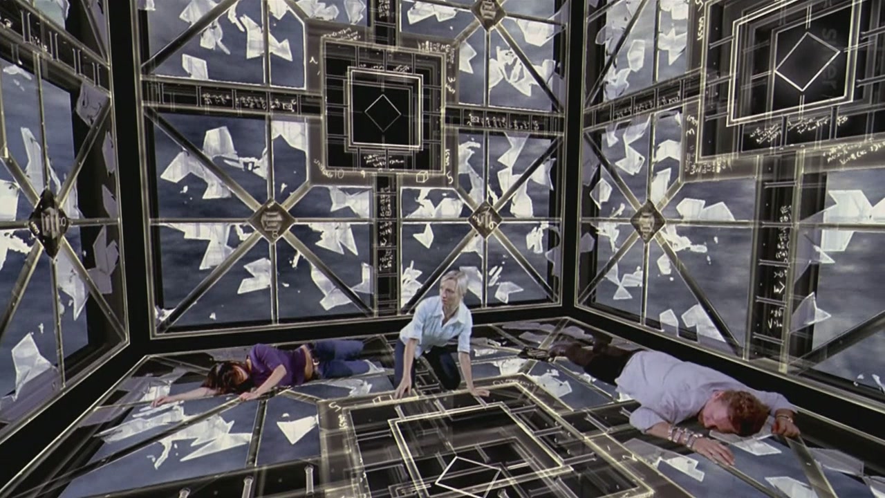 Trapped in a hyper-dimensional labyrinth - (l to r) Grace Lynn Kung, Kari Matchett and Geraint Wyn Davies in Cube 2: Hypercube (2002)