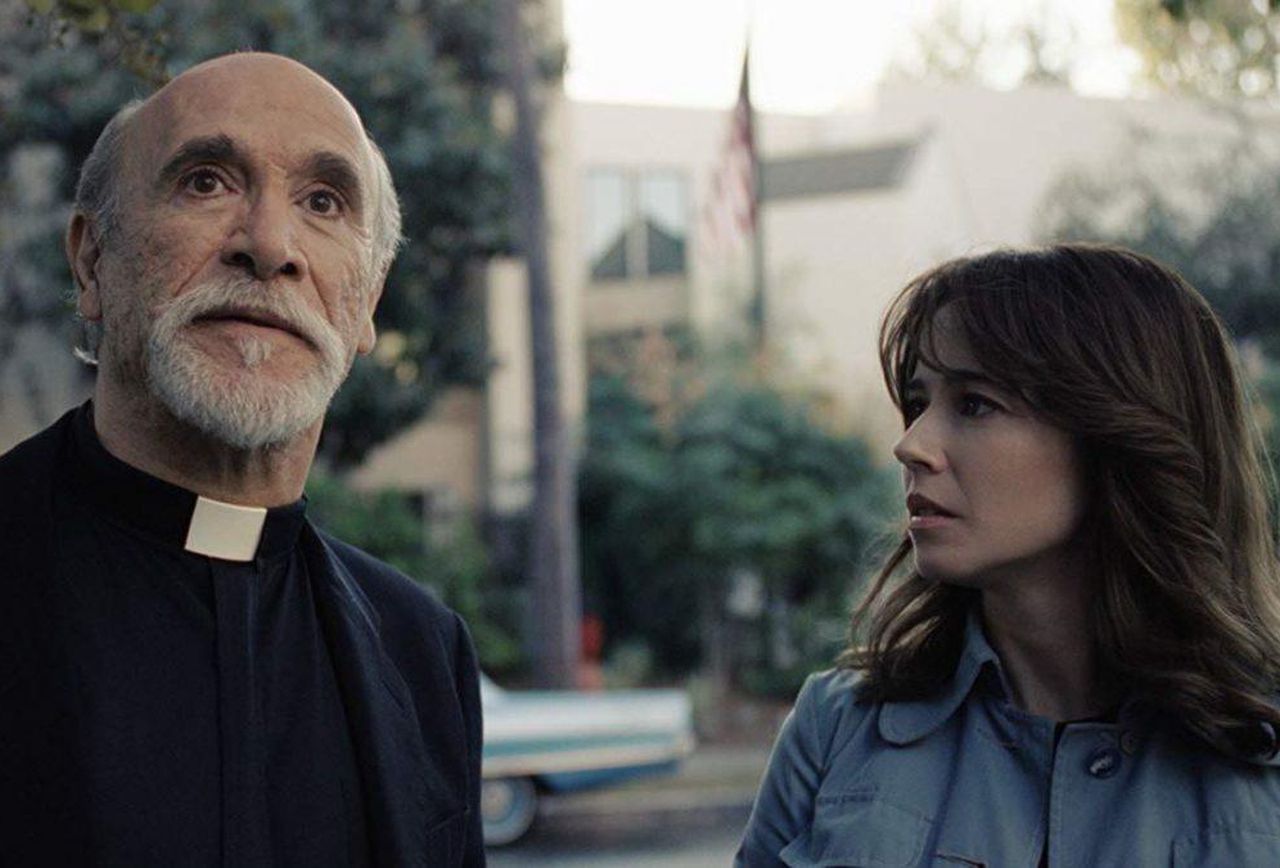 Linda Cardellini and Tony Amendola as Father Perez who connects up to the rest of The Conjuring Universe in The Curse of La Llorona (2019)