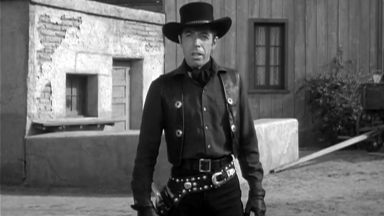 Michael Pate as the vampire gunslinger Drake Robey in Curse of the Undead (1959)