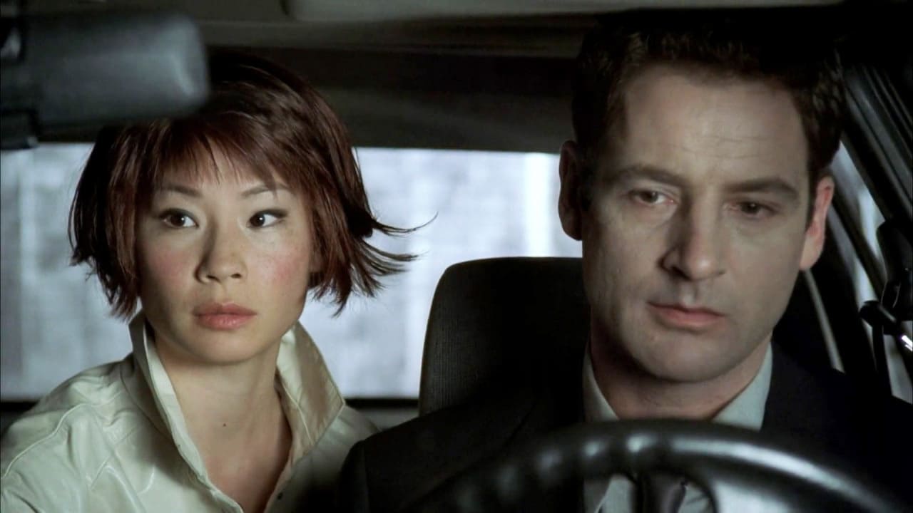 Jeremy Northam and Lucy Liu in Cypher (2002)