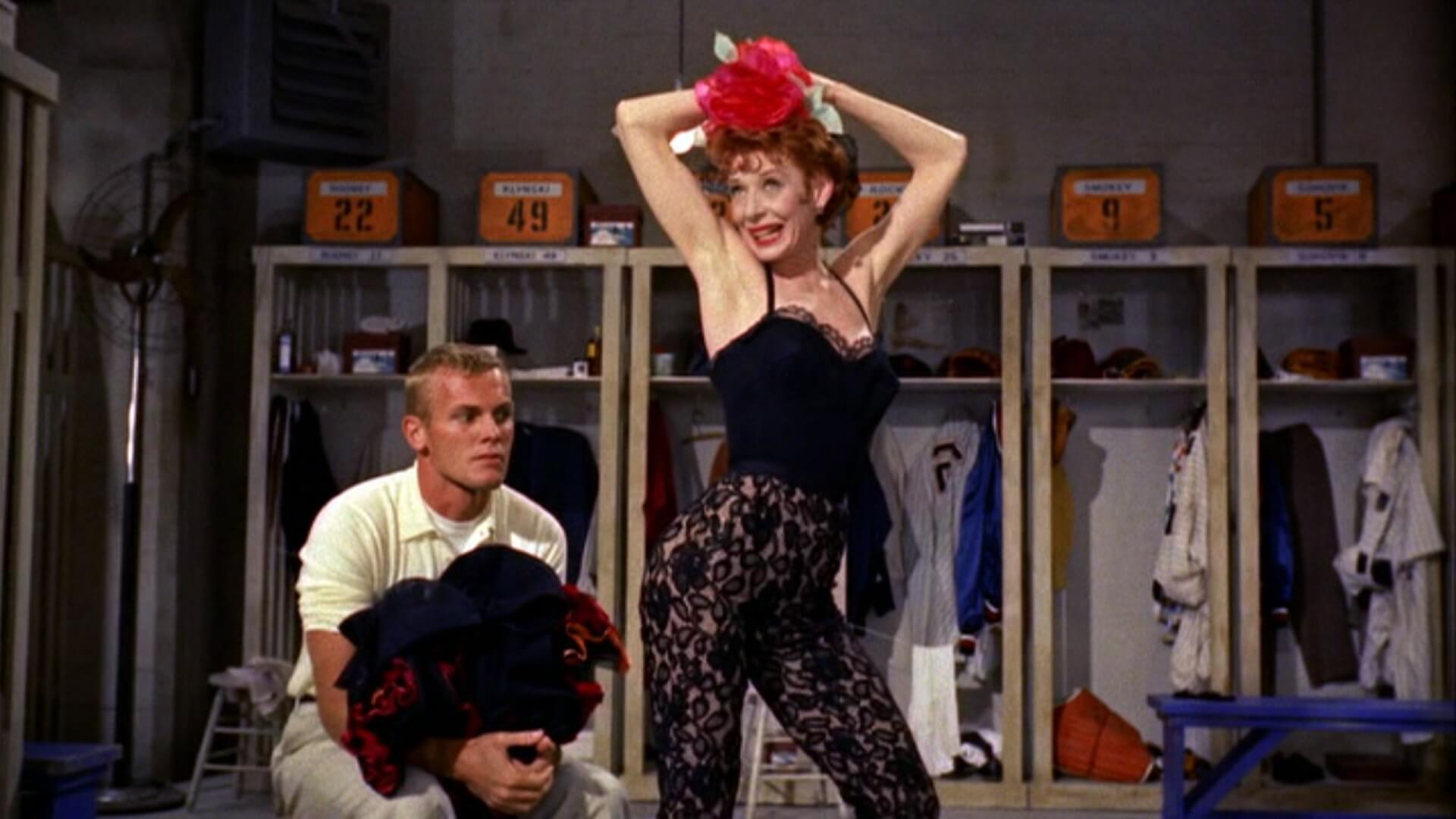 Lola (Gwen Verdon) tempts Joe Hardy (Tab Hunter) in Damn Yankees (1958)