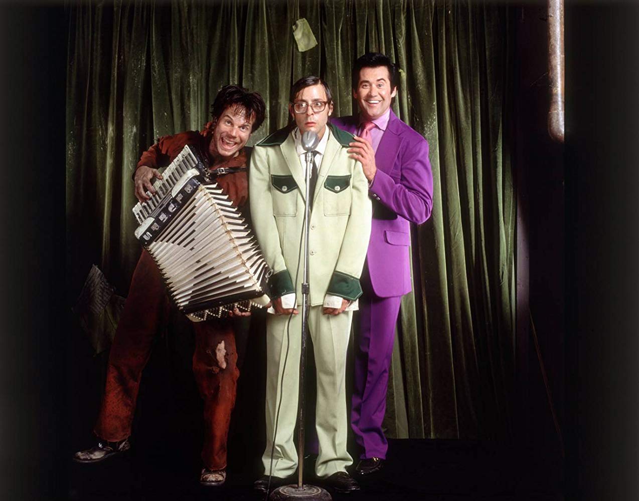 Bill Paxton, Judd Nelson, Wayne Newton in The Dark Backward (1991)