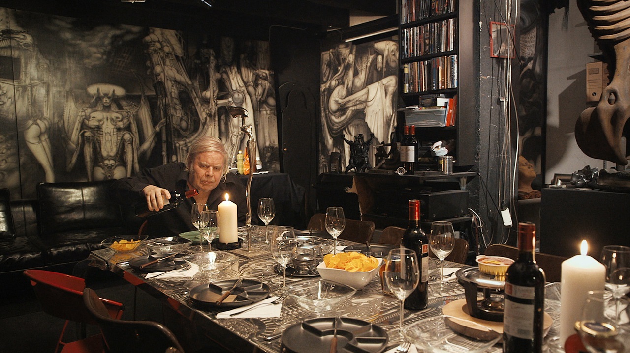 H.R. Giger in his home surrounded by his artwork in Dark Star: H.R. Giger’s World (2014)