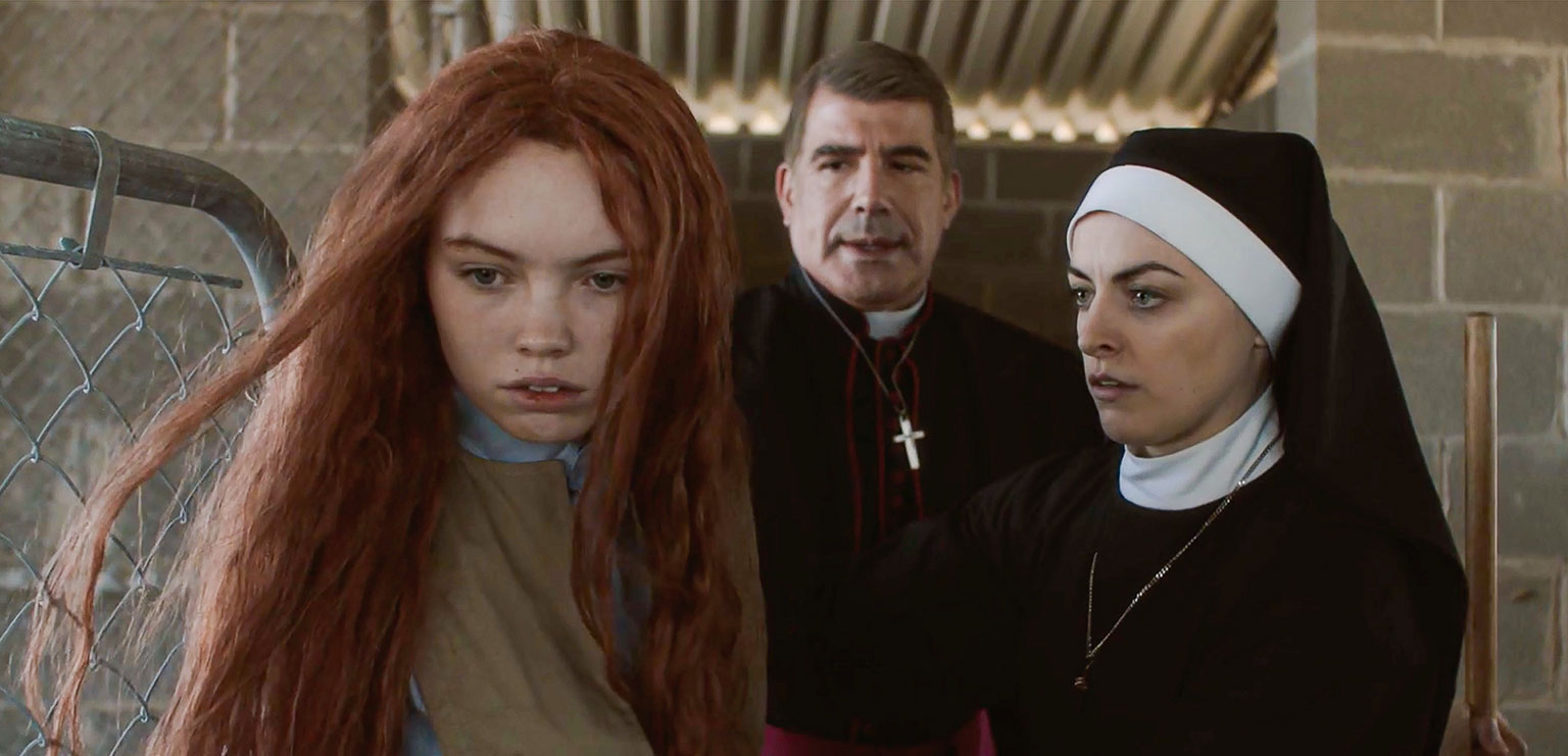 Darlin' (Lauryn Canny), The Bishop (Bryan Batt) and Sister Jennifer (Nora-Jane Noone) in Darlin' (2019)