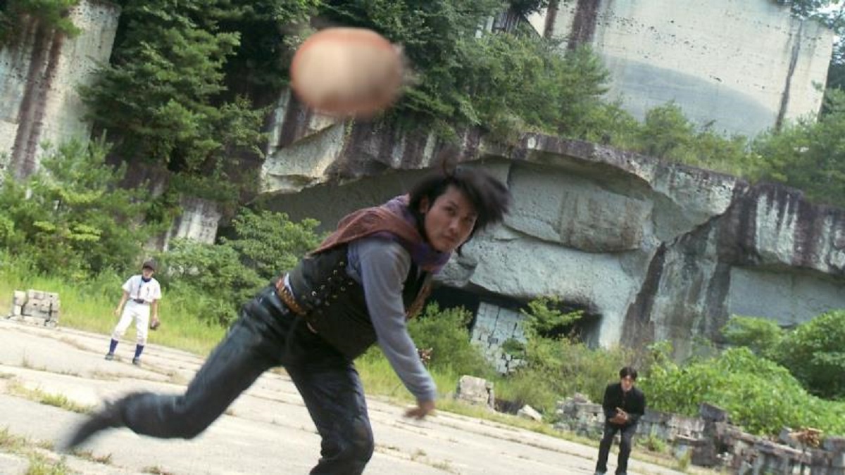 Jubei Yakyu (Tak Sakaguchi) pitches the ball in Dead Ball (2011)