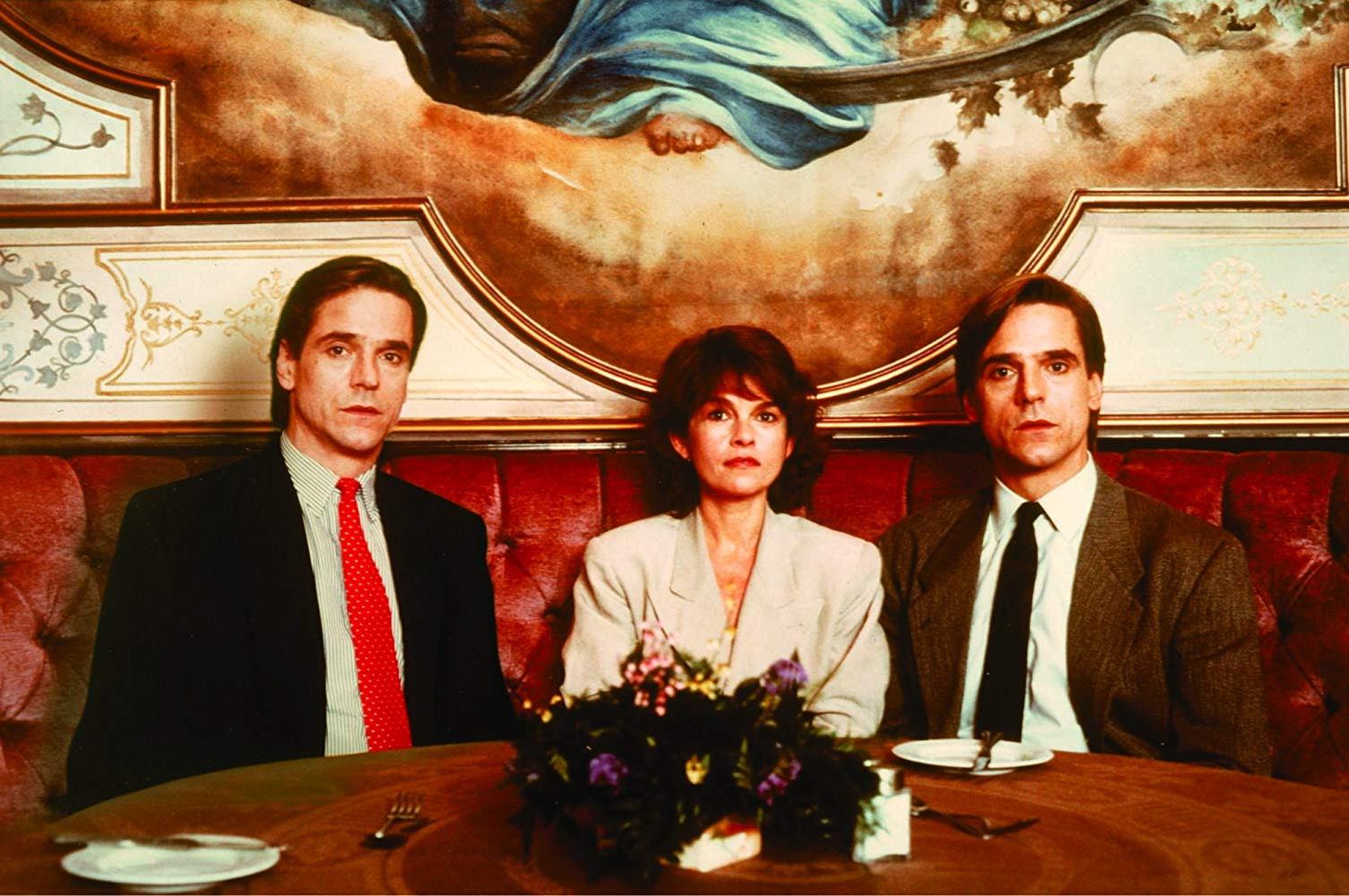 Jeremy Irons as the Mantle twins with Genevieve Bujold in Dead Ringers (1988)