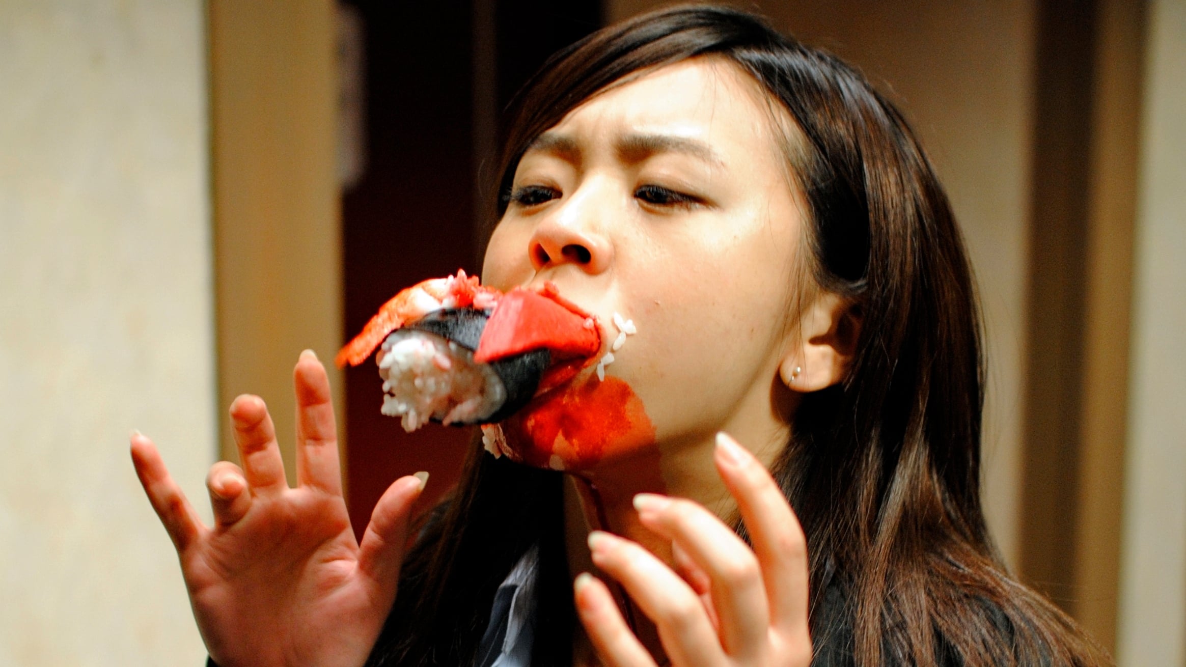 Attack by killer sushi in Dead Sushi (2012)