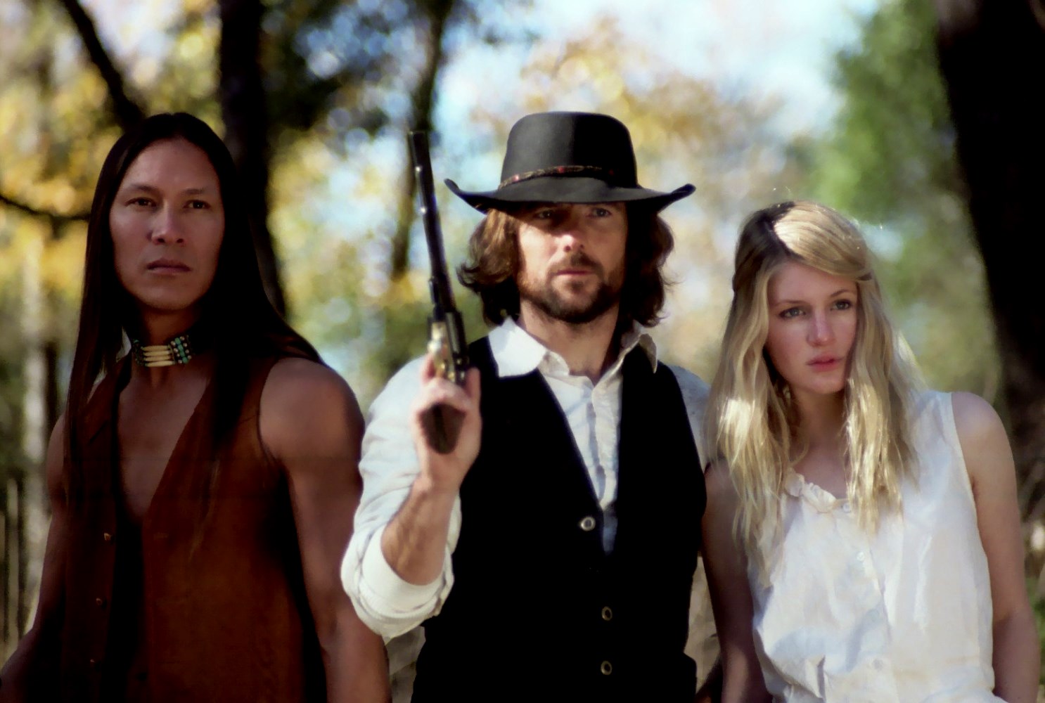 Brother Wolf (Rick Mora), Mortimer (David Lockhart) and Rhianna (Camille Montgomery) in The Dead and the Damned (2010)