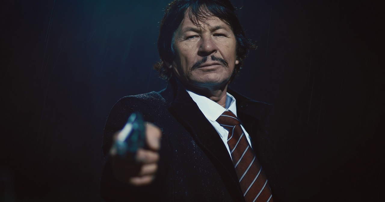 Robert Kovacs as The Stranger, an uncanny ringer for the late Charles Bronson in Death Kiss (2018)